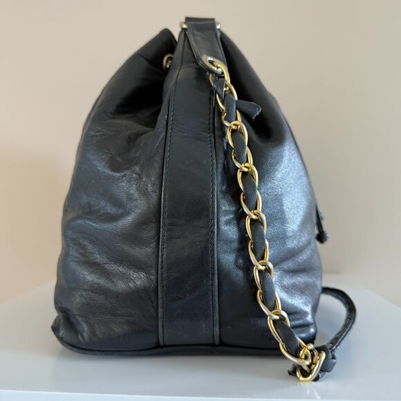 CHANEL | CC Logo Embossed Black Lambskin Drawstring Bucket Bag - Picture 4 of 8